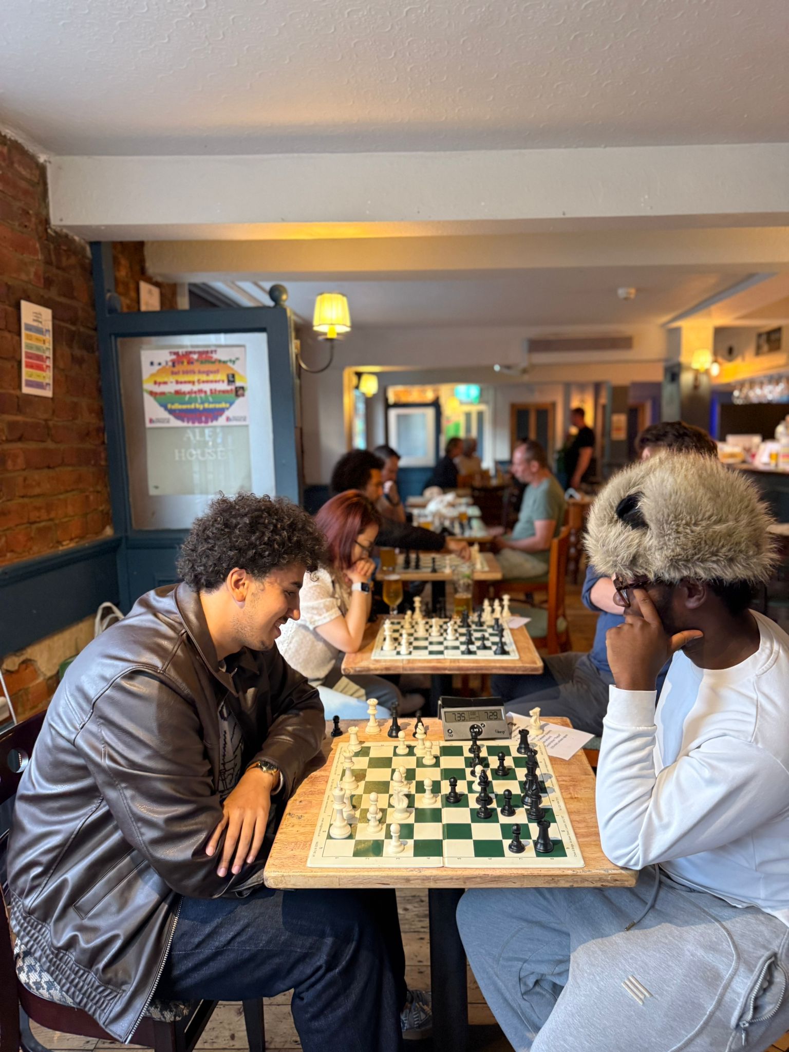 Two people enjoying a friendly game at a Social Chess night